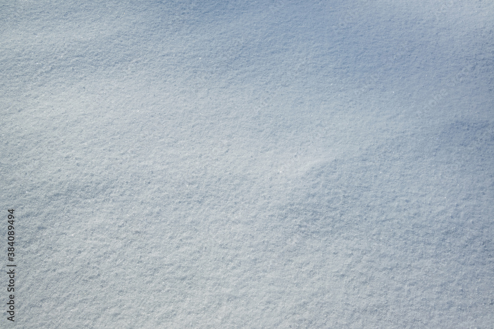 Fototapeta premium Fresh snow with morning sunlight as background