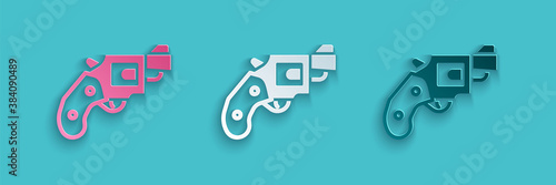 Paper cut Small gun revolver icon isolated on blue background. Pocket pistol for self-defense. Ladies revolver. Spy Weapon. Paper art style. Vector.