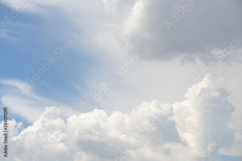 Sky with white clouds pattern background. Sky and clouds in daylight. Outdoor natural background. © Lifestyle Graphic