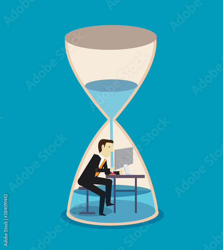 Businessman working in hourglass