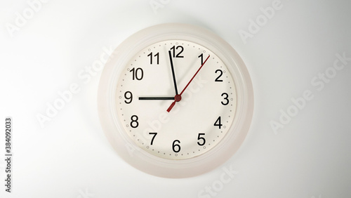 White clock isolated on white background Showtime 08.58 am, Time concept..