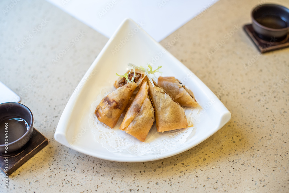 Chinese Cantonese-style morning tea and fried chicken spring rolls Chinese Cantonese-style morning tea and fried chicken spring rolls