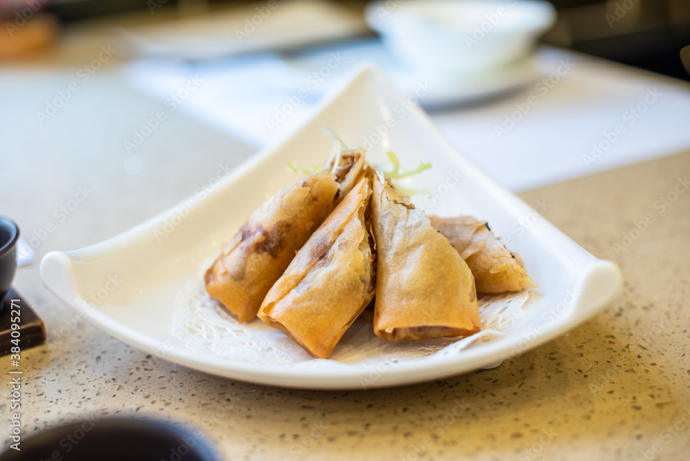 Chinese Cantonese-style morning tea and fried chicken spring rolls Chinese Cantonese-style morning tea and fried chicken spring rolls