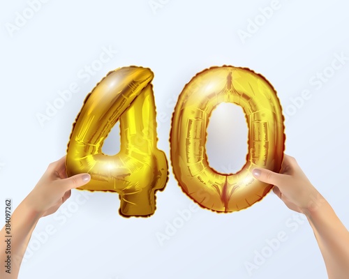 Golden metal balloon number forty 40. party decoration with Golden balloons. The number 40 is in your hand.Anniversary sign for a happy holiday, birthday, New year. The design of the metal balloon.