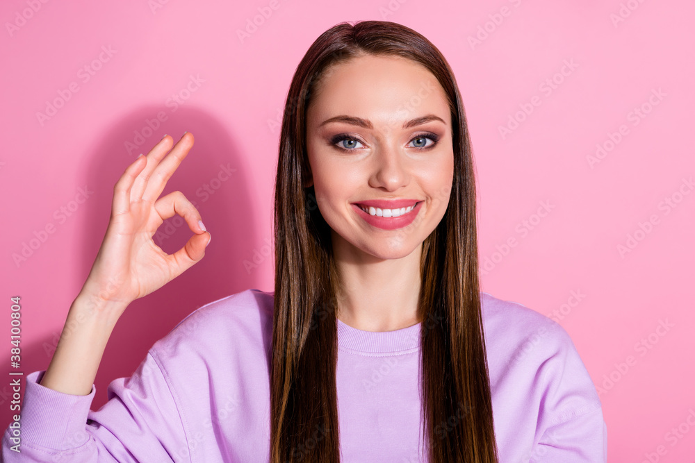 Closeup photo of attractive cheerful lady show okey symbol good mood expressing agreement approve quality expert wear casual purple sweater isolated pink pastel color background Closeup photo of attractive cheerful lady show okey symbol good mood expressing agreement approve quality expert wear casual purple sweater isolated pink pastel color background