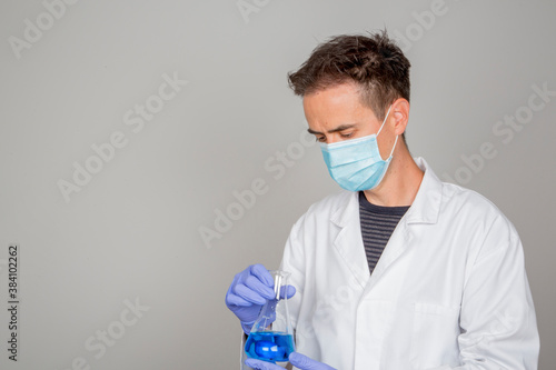 doctor in laboratory investigating covid 19 coronavirus vaccine