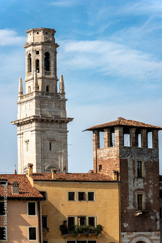Verona. Bell tower of the Verona Cathedral (Santa Maria Matricolare, VIII-XII century) and Medieval Tower of the stone bridge (Ponte Pietra). UNESCO world heritage site, Veneto, Italy, Europe.