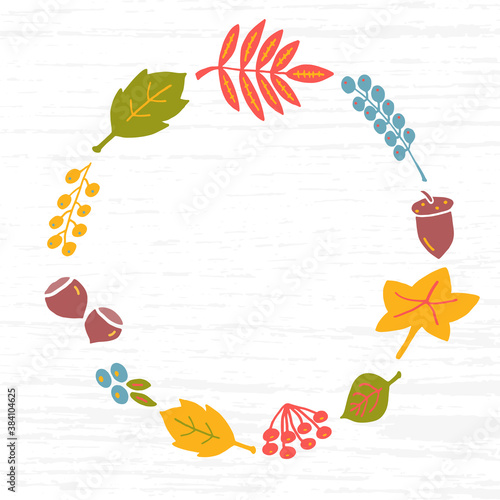 Frame in the form of the Autumn Wreath of leaves, nuts and berries against the textured tree background. Free space in the middle for inscription, title, text. 
For card, invitation, discount, sale.
