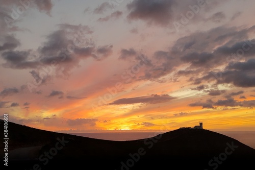 Korsika Meer Sonnenuntergang Leuchtturm Abendrot Wolken