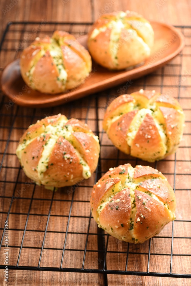 Viral and popular bread. Korean cream cheese garlic bread. Bread filled with cream cheese poured with garlic and butter sauce.