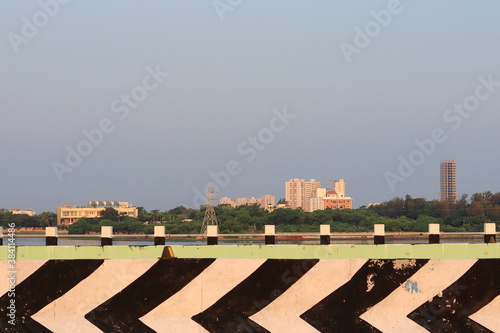 Chennai TamilnaduI , India. Oct 07, 2020. I Large private modern buildings near the salt water lake across the road, India