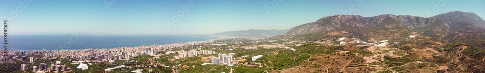 Aerial panorama of Mahmutlar city near Alania, Antalya province, Turkey. Resort apartments for vacations bought by many people here.