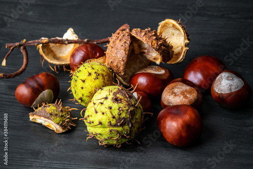 Fresh chestnuts on a wooden table