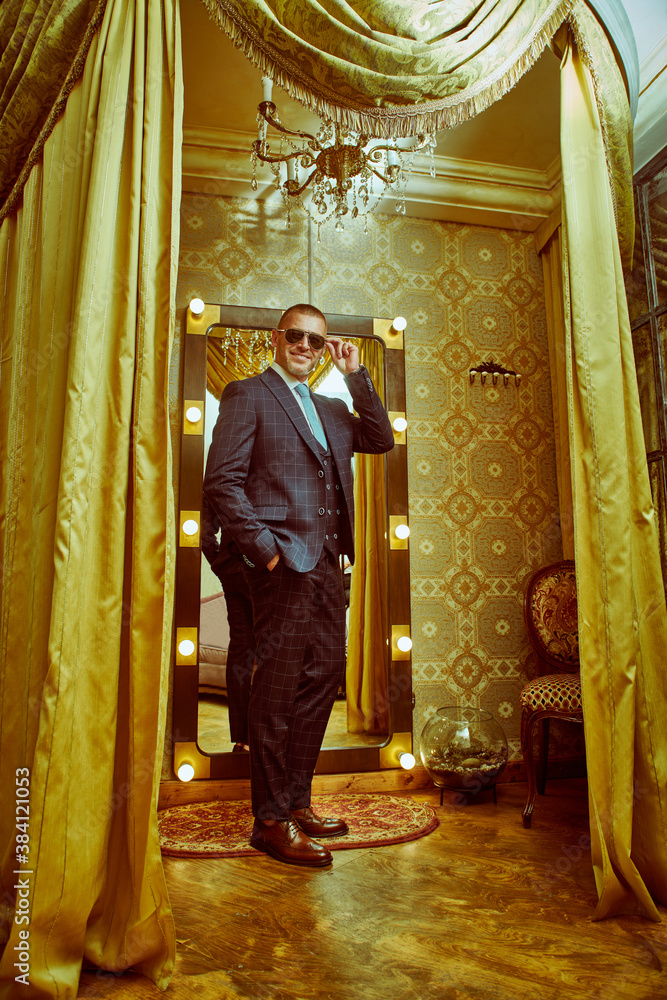 Fototapeta premium wealthy man in elegant suit