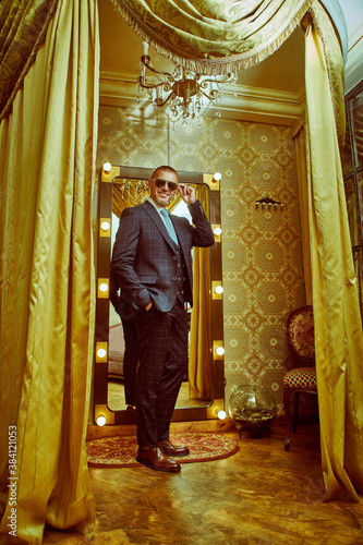 wealthy man in elegant suit © Andrey Kiselev