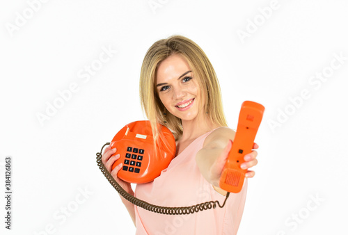 Get on the phone. telephone conversation with friend. Cheerful woman talking on land line phone. connection and communication. pretty woman with retro phone. modern and vintage technology