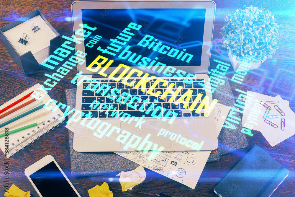 Naklejka premium Double exposure of blockchain theme hologram and table with computer background. Concept of bitcoin crypto currency.