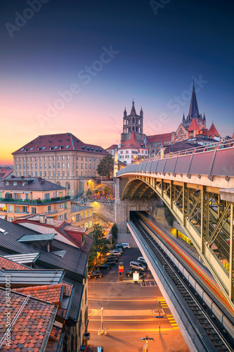 Obraz na płótnie City of Lausanne. Cityscape image of downtown Lausanne, Switzerland during beautiful autumn sunset. w salonie
