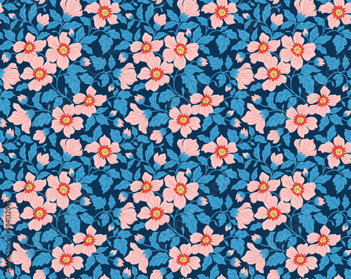 Elegant floral pattern in small coral flowers and blue leaves. Liberty style. Floral seamless background for fashion prints. Ditsy print. Seamless vector texture. Spring bouquet.