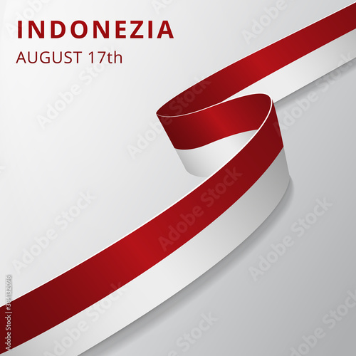 Flag of Indonezia. 17th of August. Vector illustration. Wavy ribbon on gray background. Independence day. National symbol. Graphic design template. photo