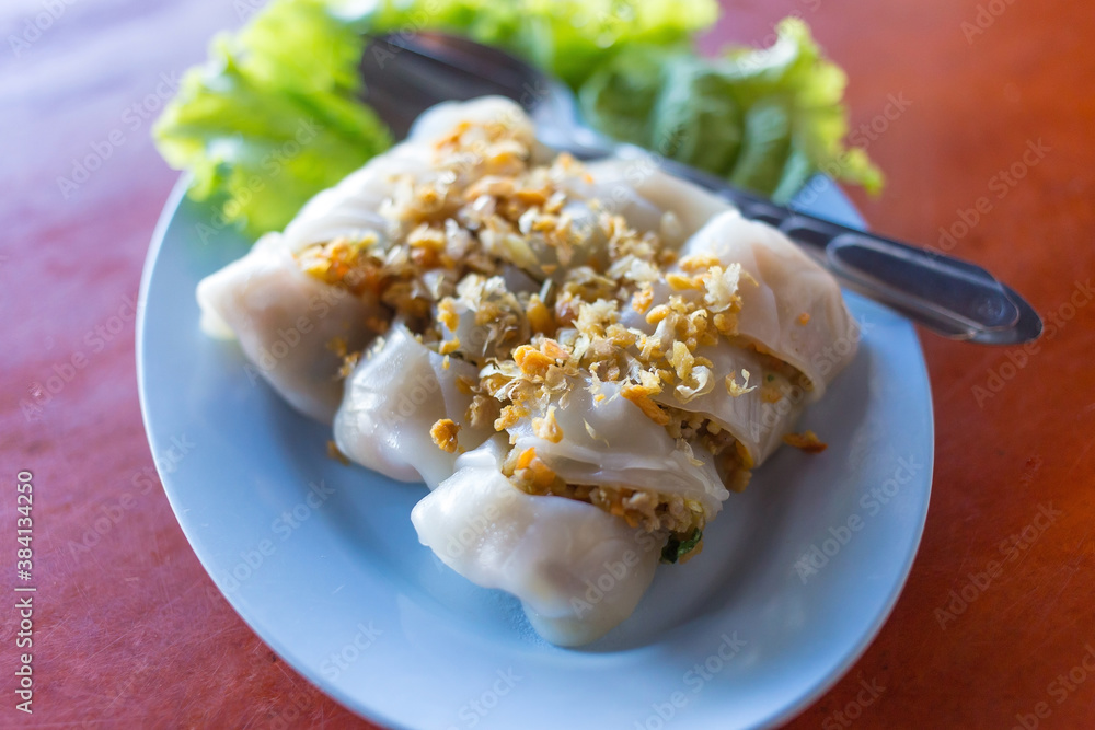 Noodle tubes is a Asian food which it contains pork and vegetables inside and fried garlic added on top. Noodle tubes is a Asian food which it contains pork and vegetables inside and fried garlic added on top.
