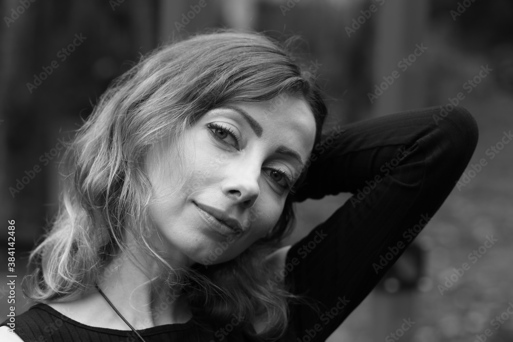 Portrait of beautiful woman outside in black and white Portrait of beautiful woman outside in black and white