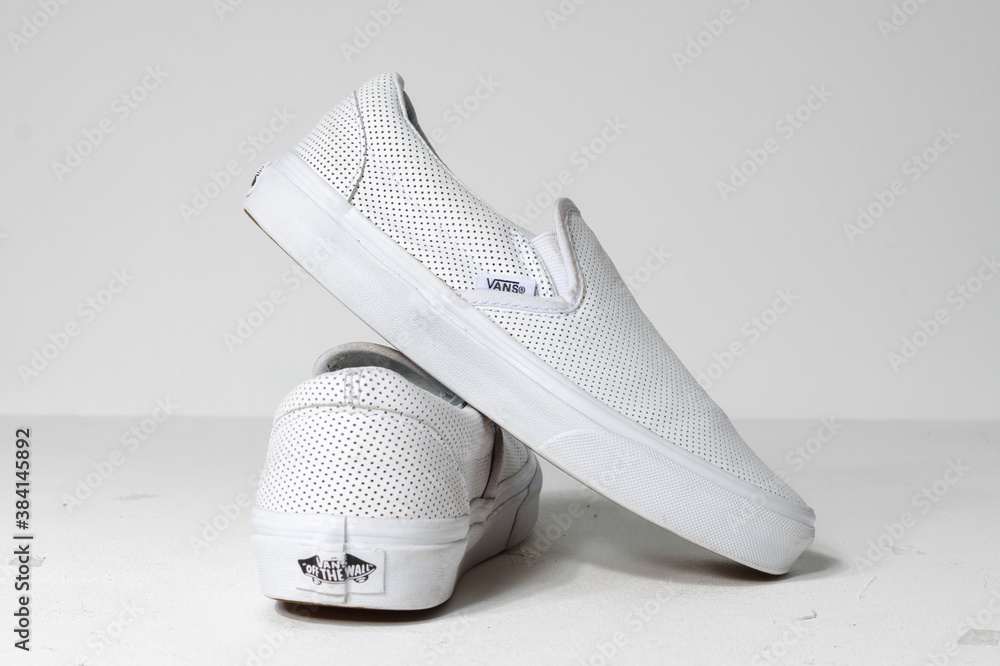 london, uk 18/05/2019 Vans authentic edition white leather perforated with gum waffle sole. Iconic retro vintage classic fashion revival sneakers. signature shoes Stock Photo | Adobe Stock
