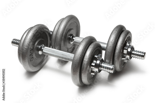 Metal dumbbells for fitness with chrome silver handle isolated on white