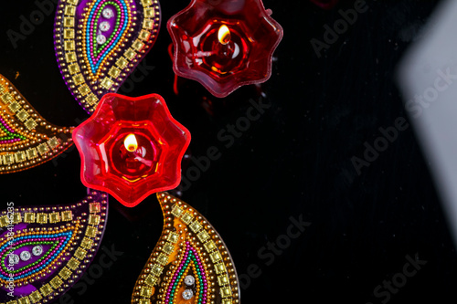 Indian festival diwali   Colorful lamps of oil on dark background
