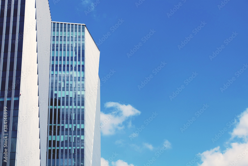 building with blue clear sky background, lookup to the angle of the corner building, business building background building with blue clear sky background, lookup to the angle of the corner building, business building background