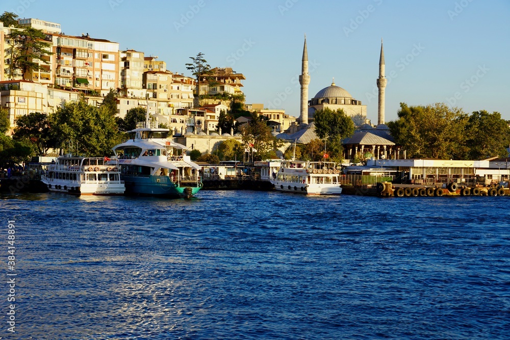 Istanbul, Bodrum - August 2020: Tour boats travel around the Bosphorus Canal on clear summer days. Bosphorus Sunset Cruise, Sultanahmet, 