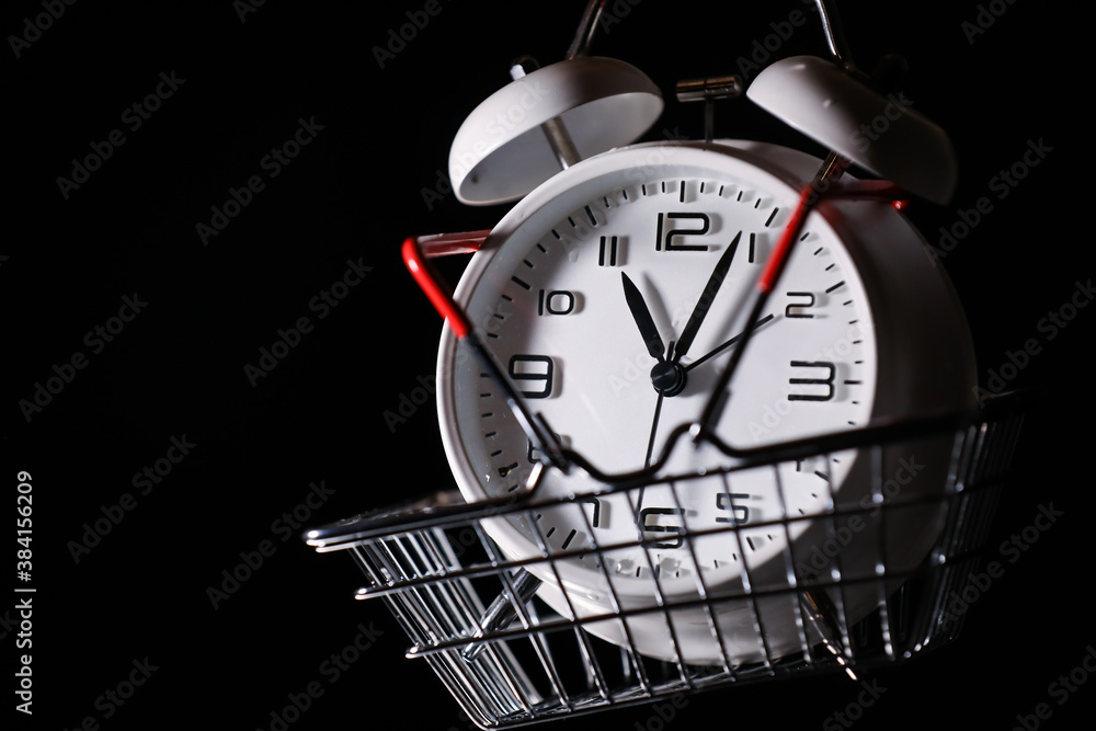 custom made wallpaper toronto digitalRed shopping basket with white retro alarm clock in it. Lose time. Buy time. Break. Motivation. Business solutions. Success. Deadline.