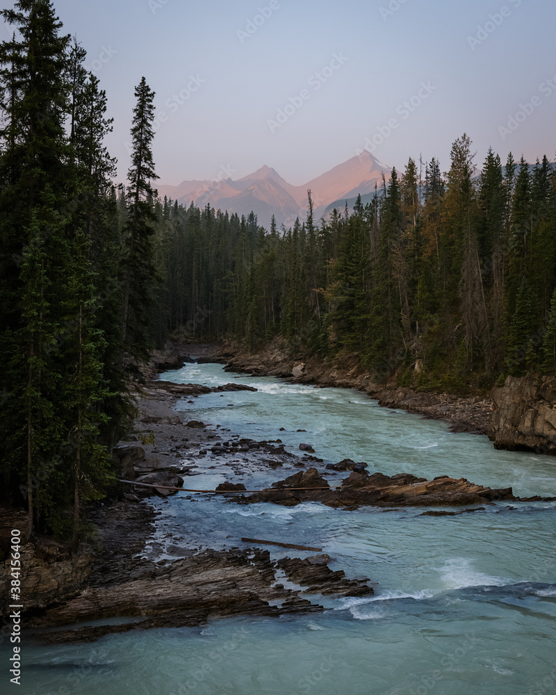 Rushing water around the Natural Bridge over at Yoho National Park in British Columbia, Canada Rushing water around the Natural Bridge over at Yoho National Park in British Columbia, Canada