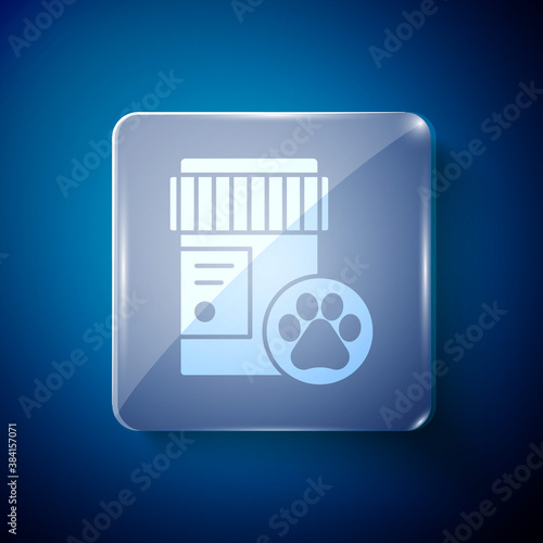 White Dog medicine bottle icon isolated on blue background. Container with pills. Prescription medicine for animal. Square glass panels. Vector.