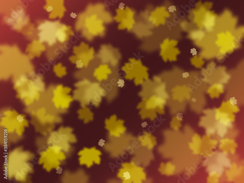Colorful autumn background with blurred yellow maple leaves on yellow brown backdrop