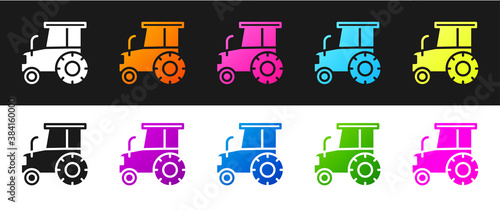 Set Tractor icon isolated on black and white background. Vector.