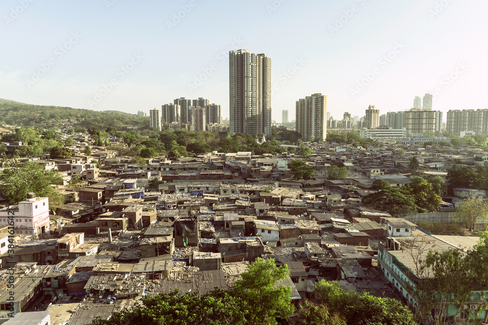 Skyscrapers and slums in a suburb in the city of Mumbai