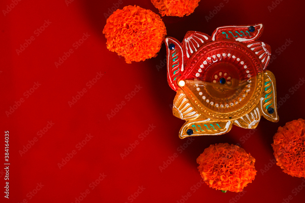 Fototapeta premium happy diwali or happy deepavali greeting card made using a photograph of diya or oil lamp