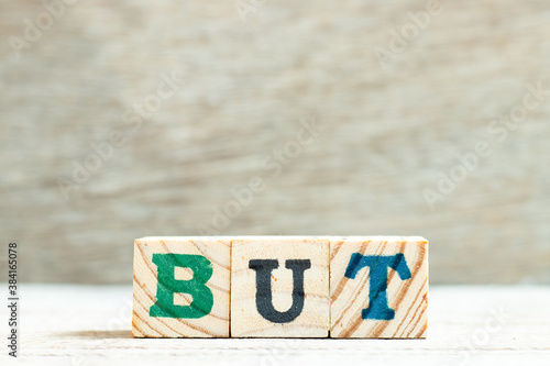 Bilde på lerret Alphabet letter in word but on wood background