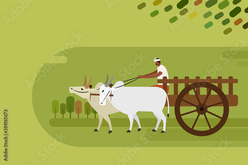 A man rides a bullock cart in rural India