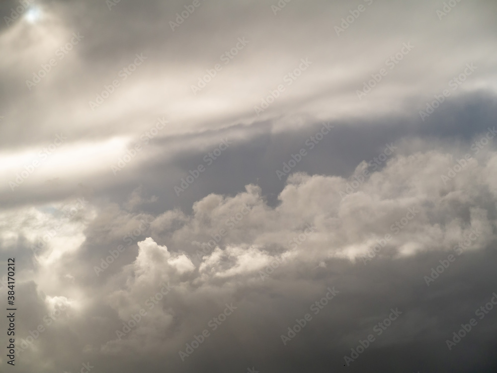 Fototapeta premium Beautiful white fluffy cloudy sky background,