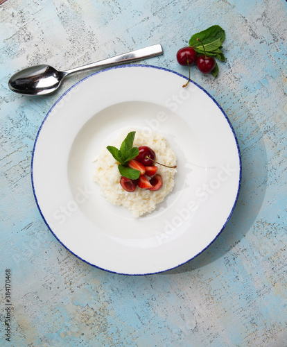 milk porridge with berries in a plate