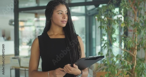 African business Woman in Office. Young business people in modern work space. We are stronger together. 4k slow motion video
