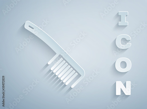Paper cut Hairbrush icon isolated on grey background. Comb hair sign. Barber symbol. Paper art style. Vector.