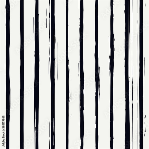 Brush strokes seamless pattern. Freehand vertical stripes print. Ink lines background. Grunge simple geometric design