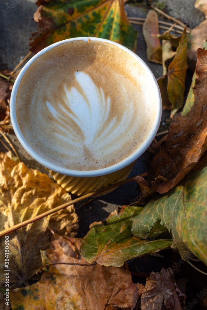 coffee cup and autumn leaves coffee cup and autumn leaves