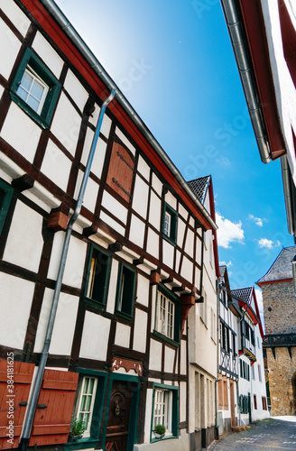 Bad Munstereifel/ Germany: View of the Historical Medieval City with the typical Half-timbered Houses and Blue Sky photo