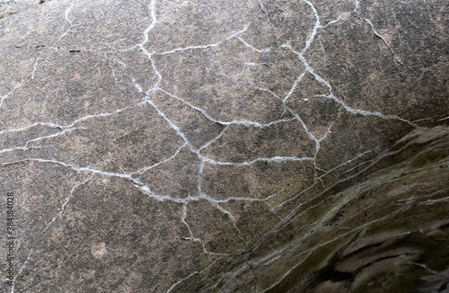 Abstract background Cracked of stone wall texture.