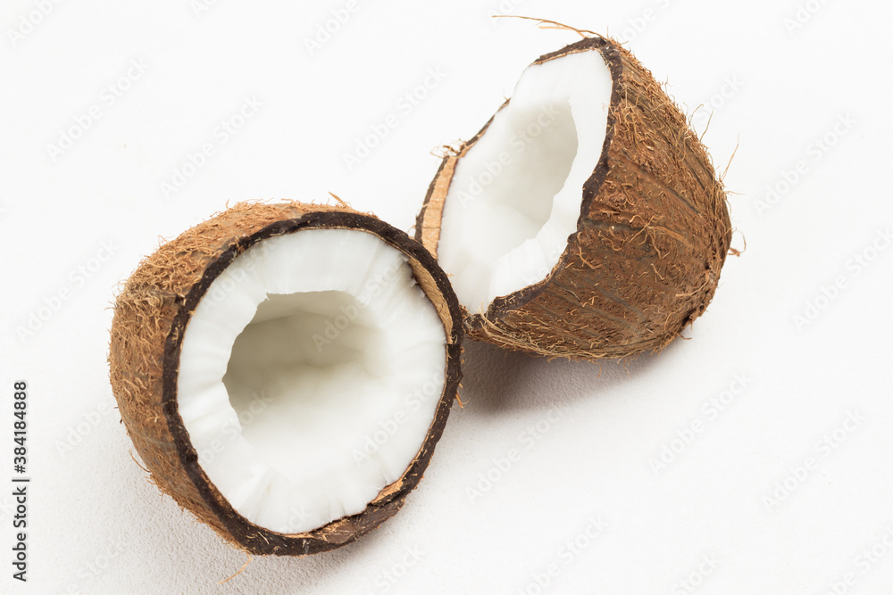 Two halves of fresh coconut. Two halves of fresh coconut.