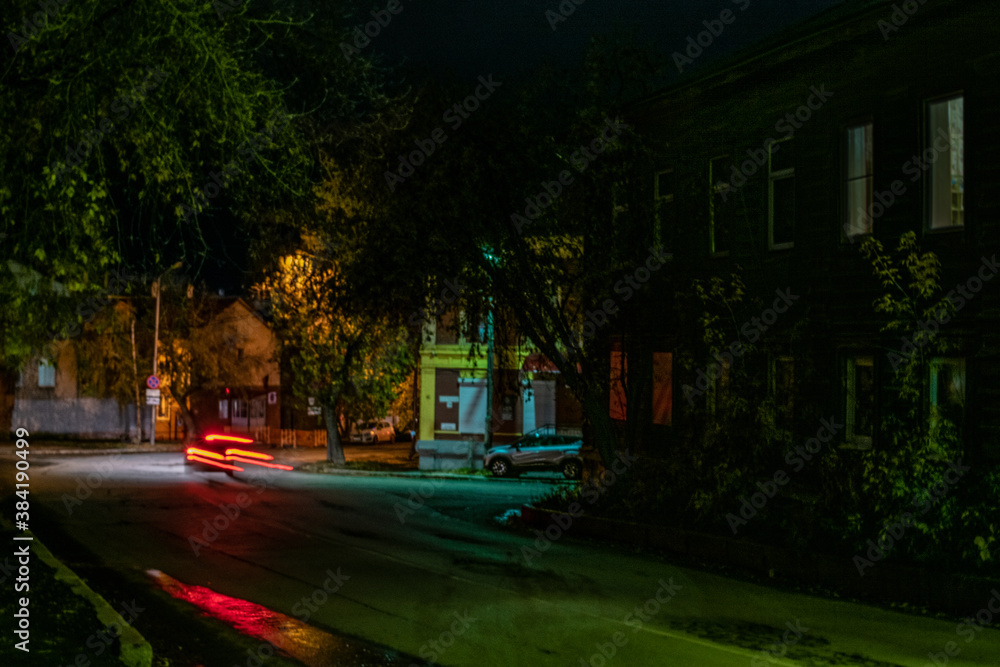 Obraz premium Long exposure night city car driving 
